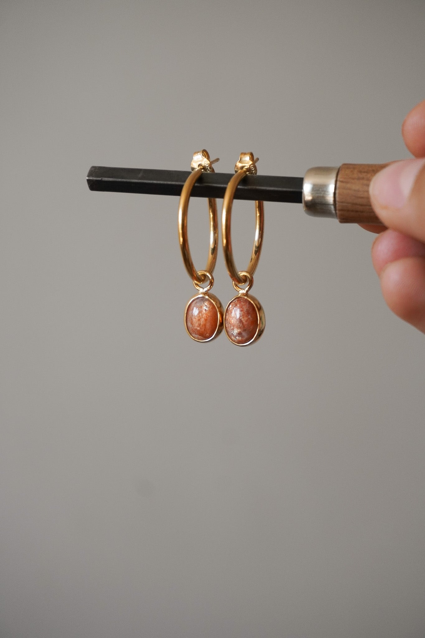 Aros sunstone (baño oro 24k)