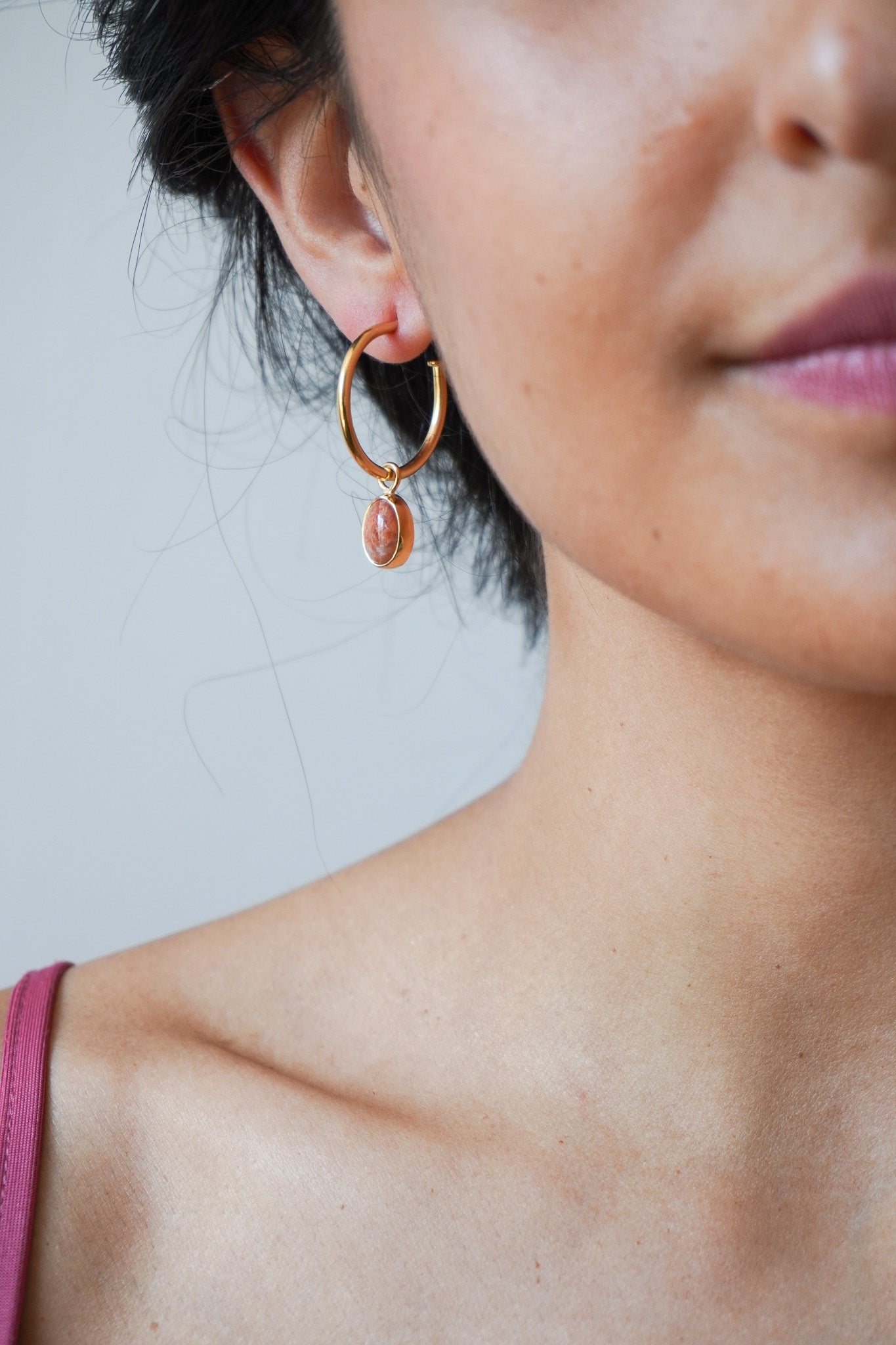 Aros sunstone (baño oro 24k)